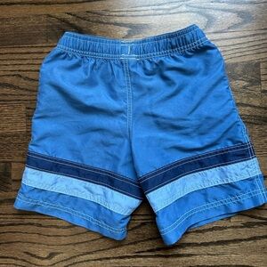 Hannah Andersson Boys Swim Trunks - size 6/7